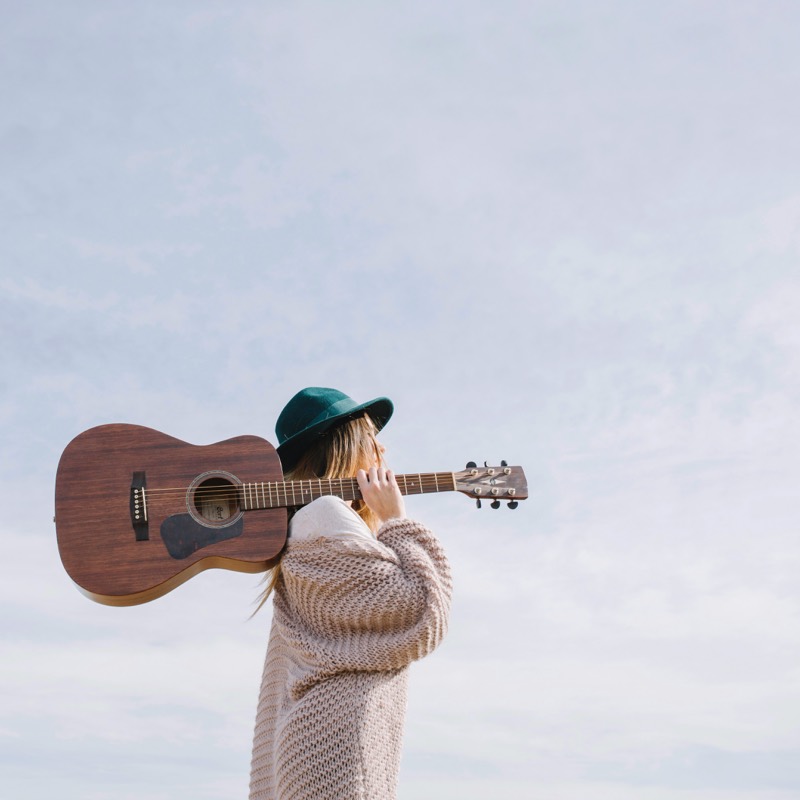 Woman holding guitar